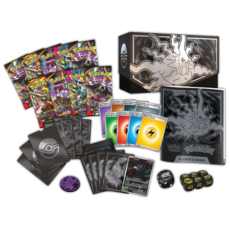 Collection of Pokémon trading cards with various packs and a die on a white background